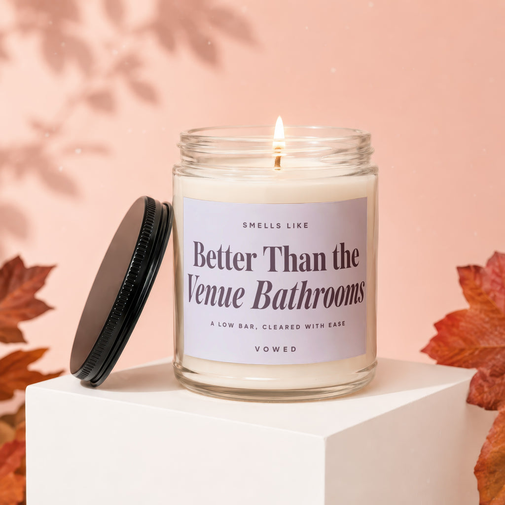 Glass jar candle with "Better Than the Venue Bathrooms" text.