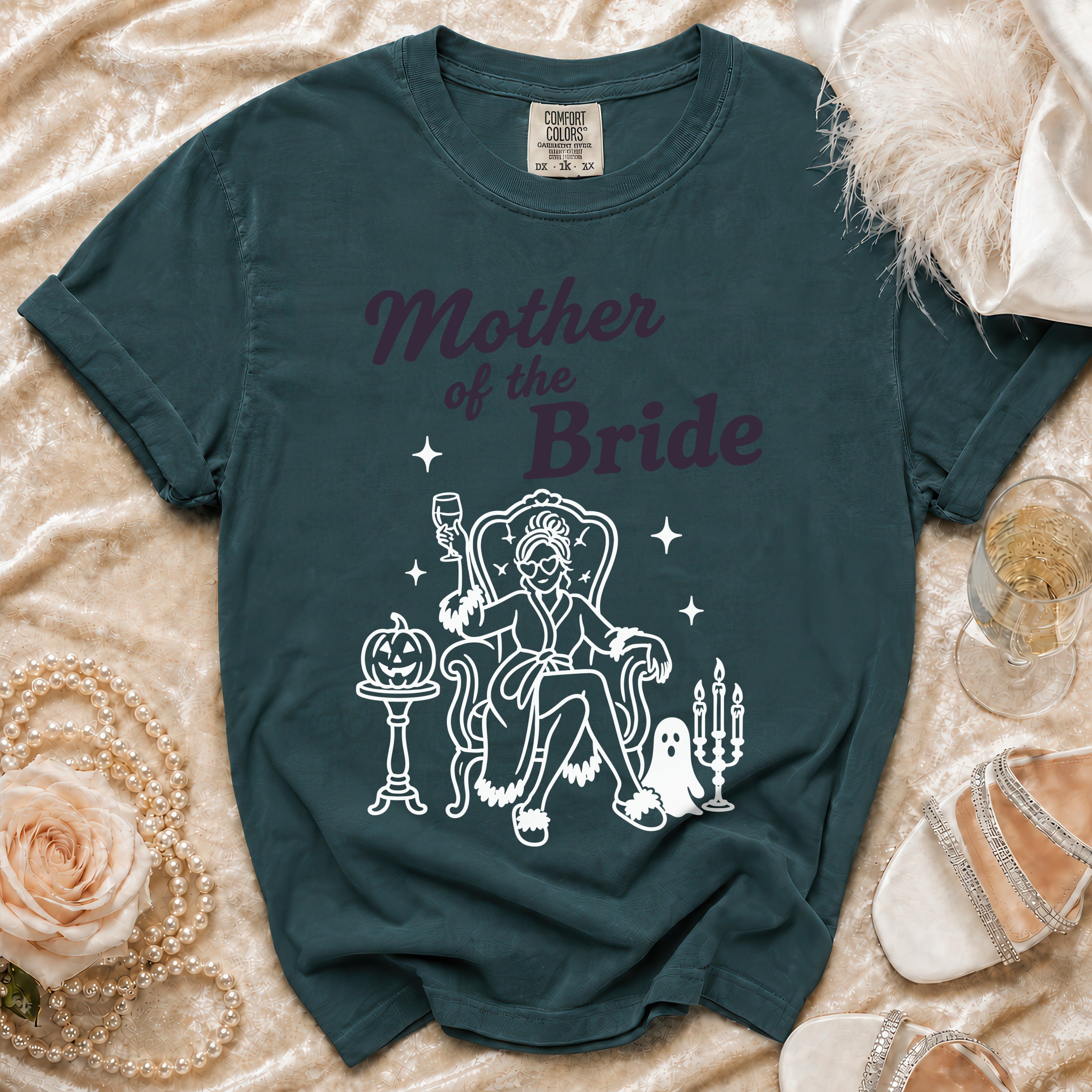 Teal Comfort Colors shirt with "Mother of the Bride" Halloween graphic.