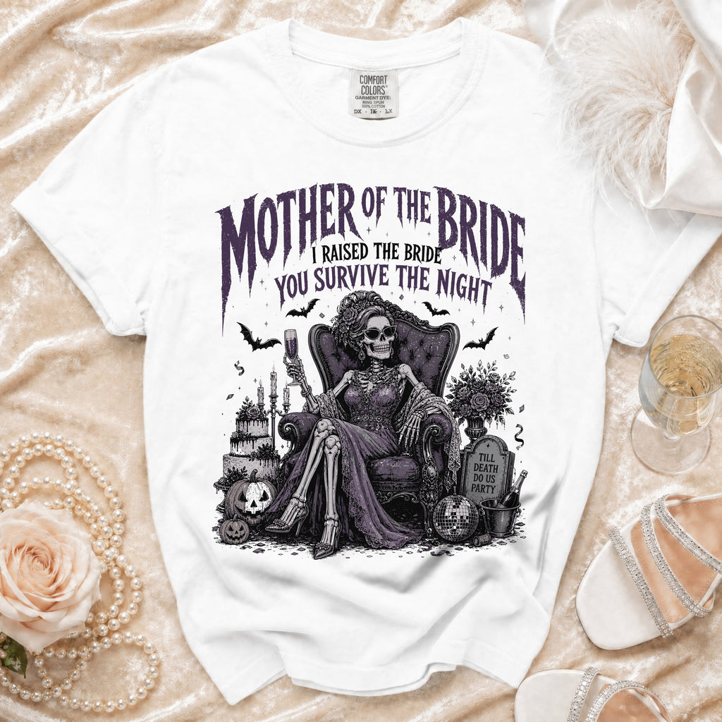 White t-shirt graphic with skeleton mother of the bride, spooky wedding theme, and text.