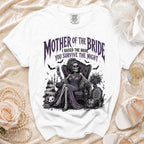 White t-shirt graphic with skeleton mother of the bride, spooky wedding theme, and text.