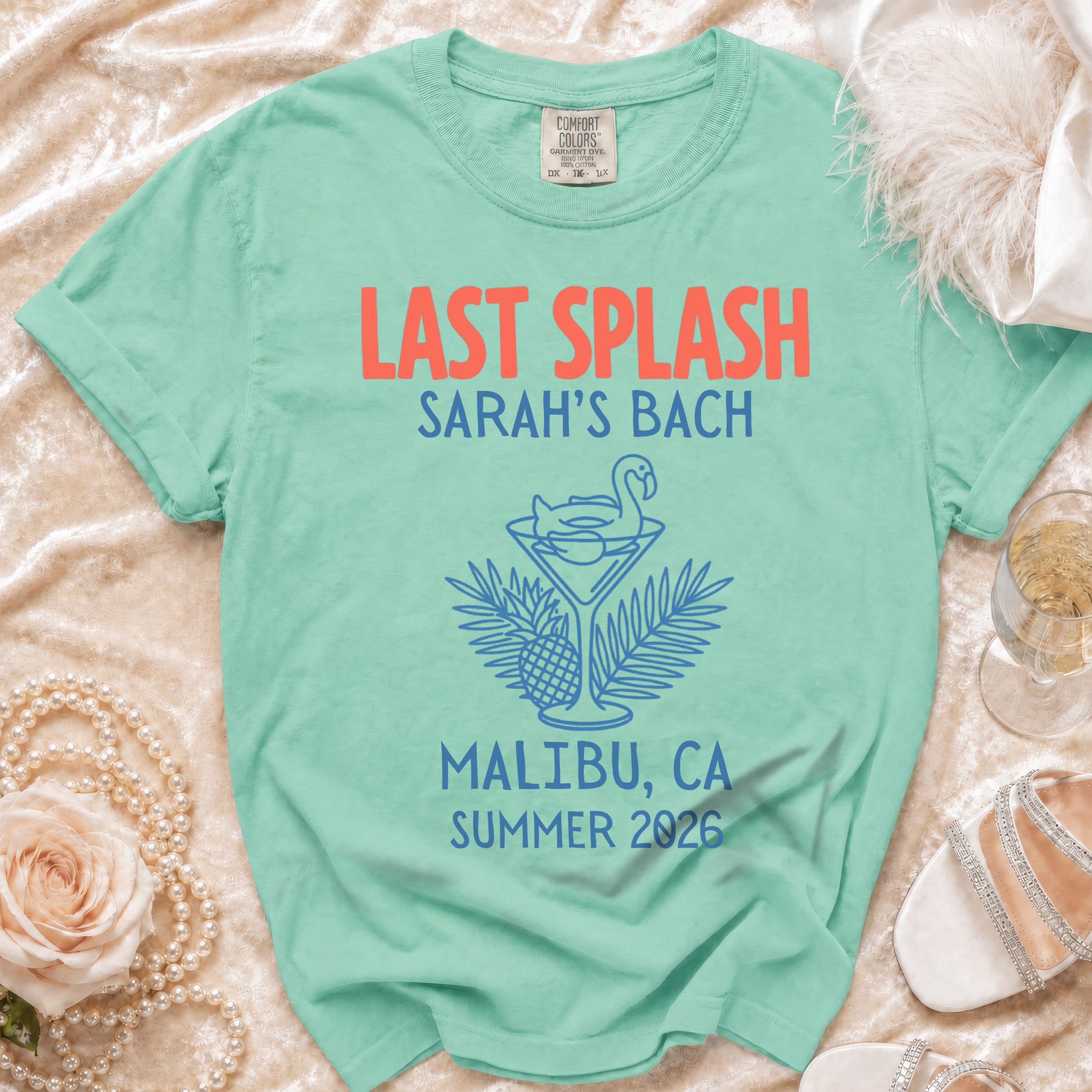 Mint green t-shirt with "Last Splash Sarah's Bach Malibu, CA Summer 2026" text.