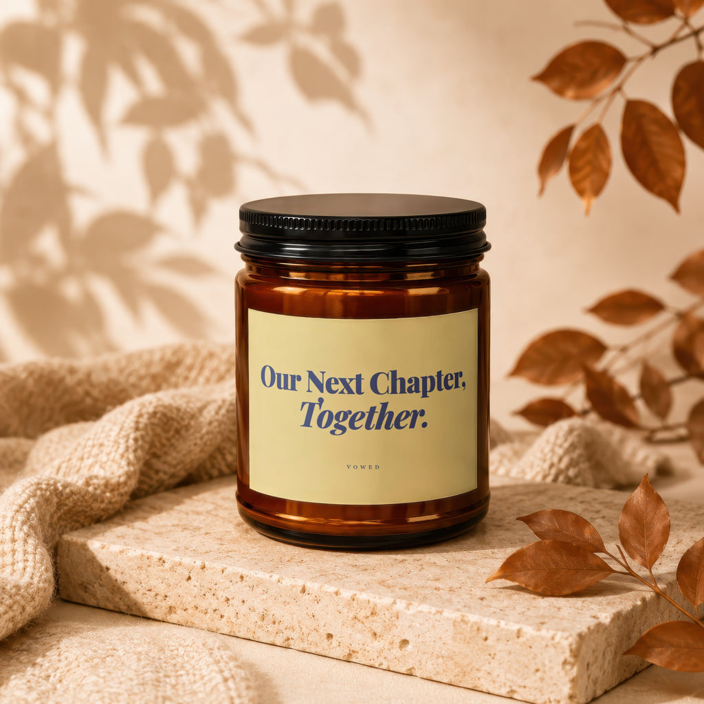 Amber candle with black lid, text "Our Next Chapter, Together."