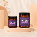 Two glass candles with "Last Fling Before the Ring" labels on purple backgrounds.