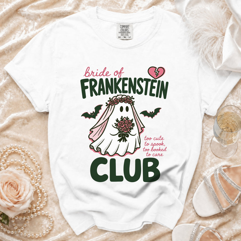 White t-shirt with "Bride of Frankenstein Club" text and ghost graphic.