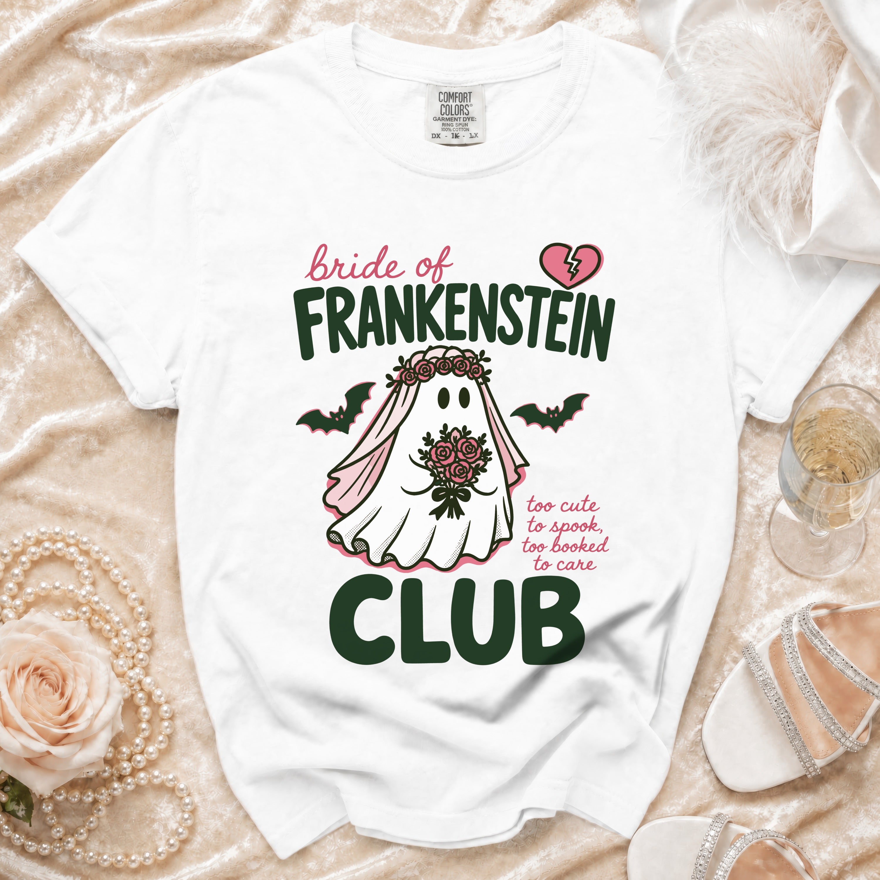White t-shirt with "Bride of Frankenstein Club" text and ghost graphic.
