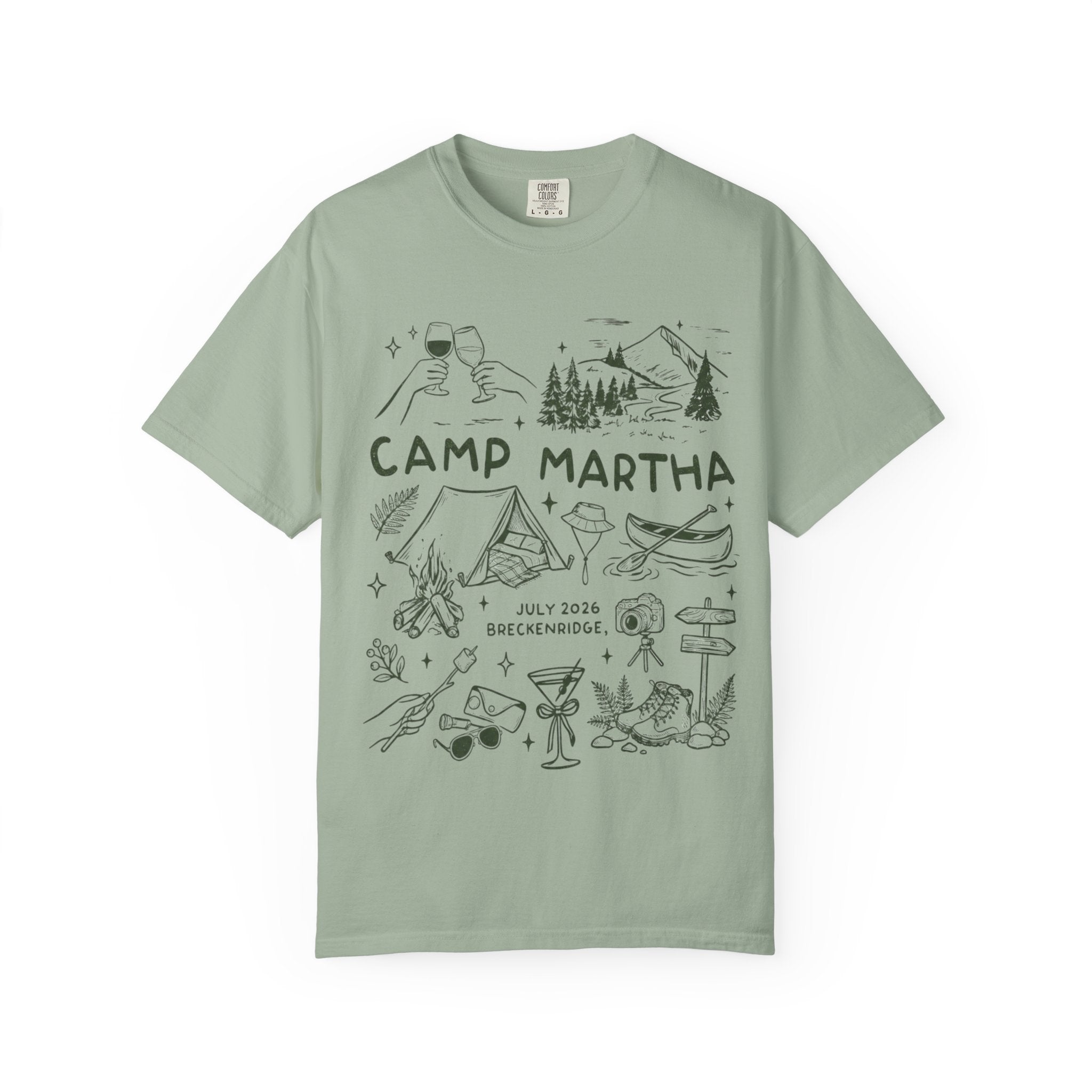 Camp Martha July 2026 Breckenridge graphic tee with camping and outdoor illustrations.