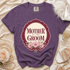 Purple t-shirt with "Mother of the Groom" text and floral design.