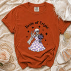 Orange t-shirt with "Bride of Fright" text and skeleton bride graphic.