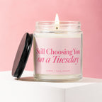 Jar candle with pink label reading "Still Choosing You on a Tuesday".