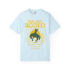 Light blue t-shirt with "Her Last Rodeo" text and cowboy on a horse graphic.