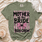 Olive green crewneck t-shirt featuring black text that reads Mother of the Bride Boo Crew over pink vertical stripes.