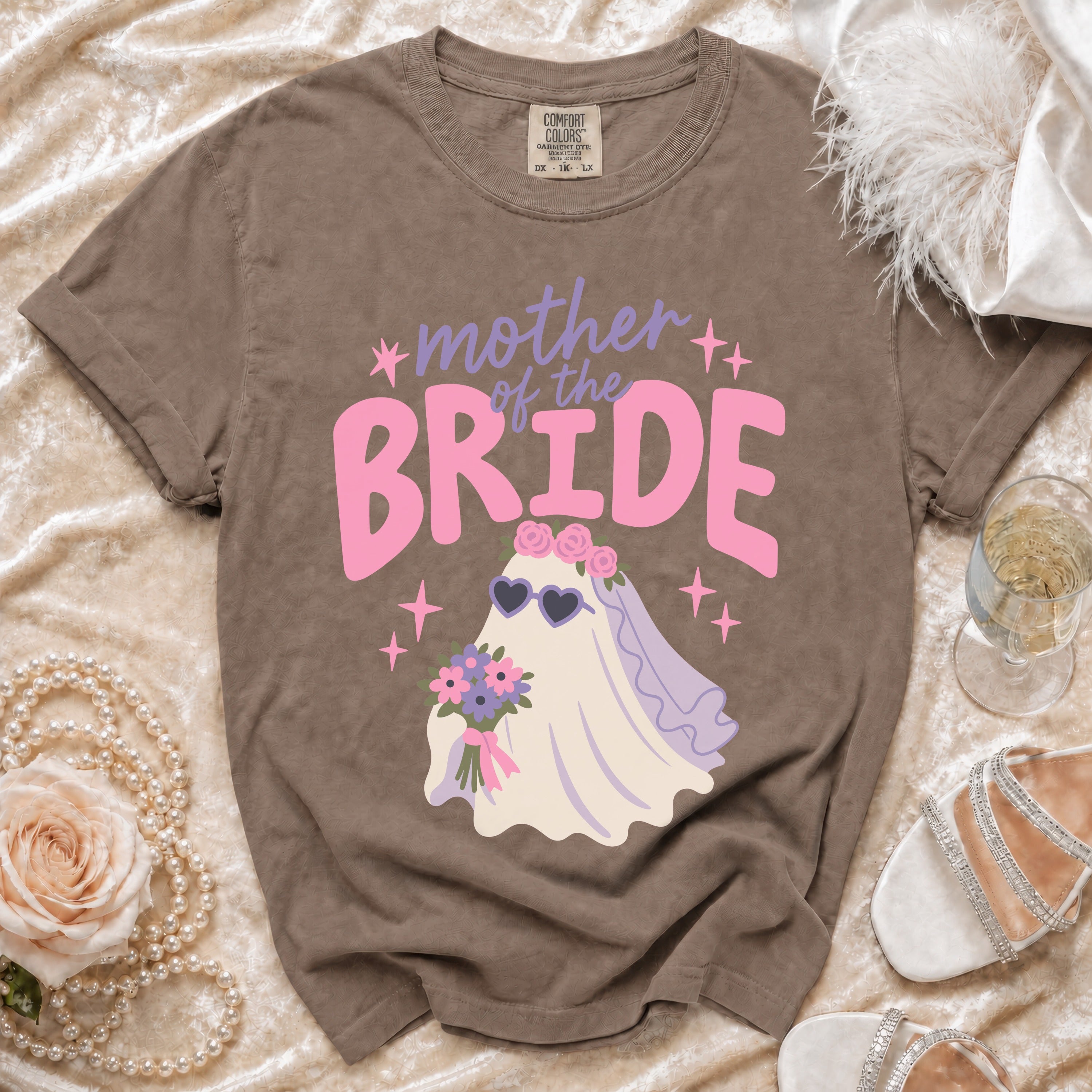 Brown t-shirt with "mother of the bride" text and ghost graphic.