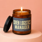 Amber jar candle lit, with lid off, labeled "Coven Logistics Manager"