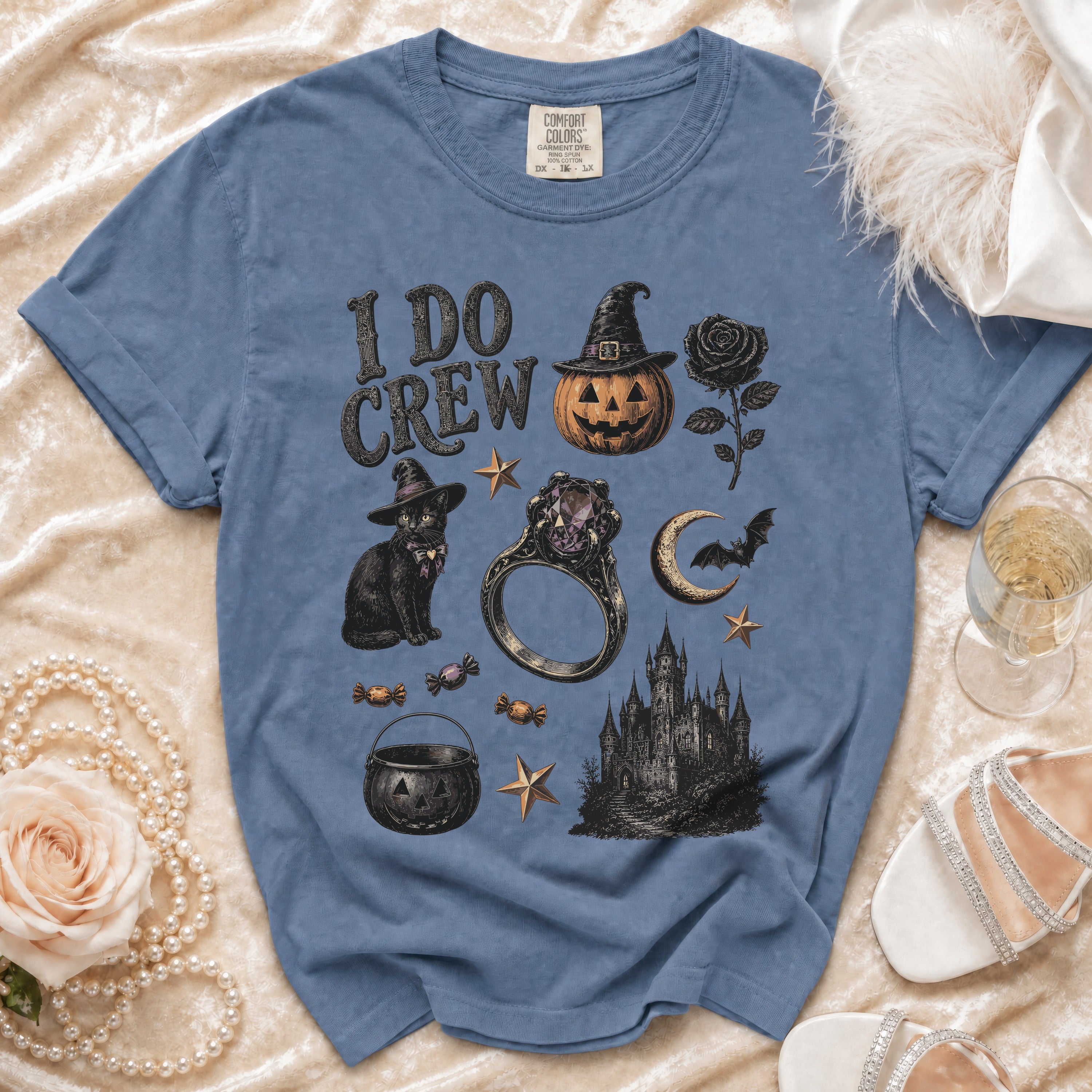 Blue t-shirt with "I Do Crew" and Halloween-themed graphics.