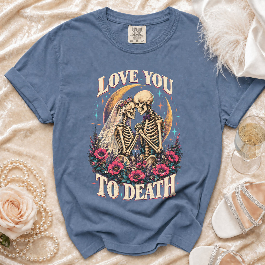 Blue t-shirt with "Love You To Death" skeleton bride and groom graphic.