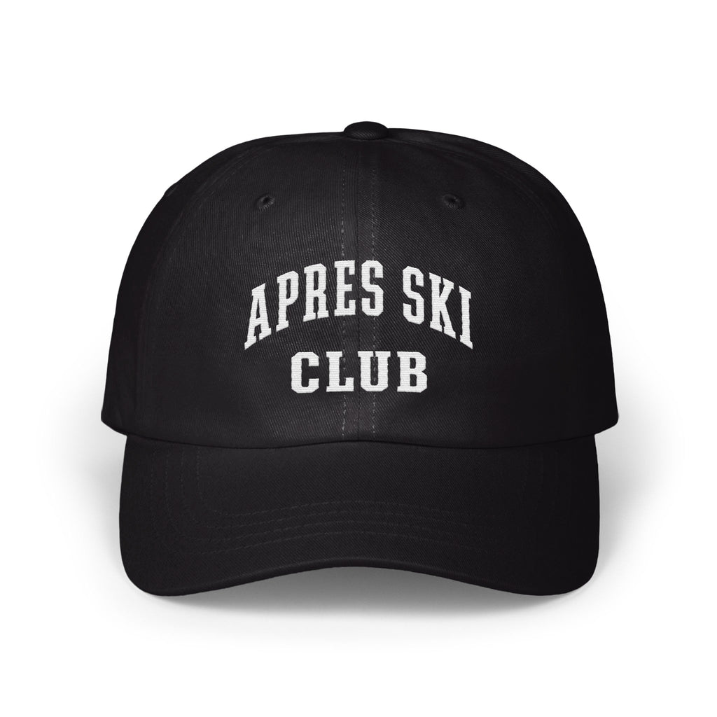 A black baseball cap with white embroidered text reading APRES SKI CLUB on the front.