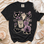 Black t-shirt with Halloween-themed graphics including cats, ghosts, and text.