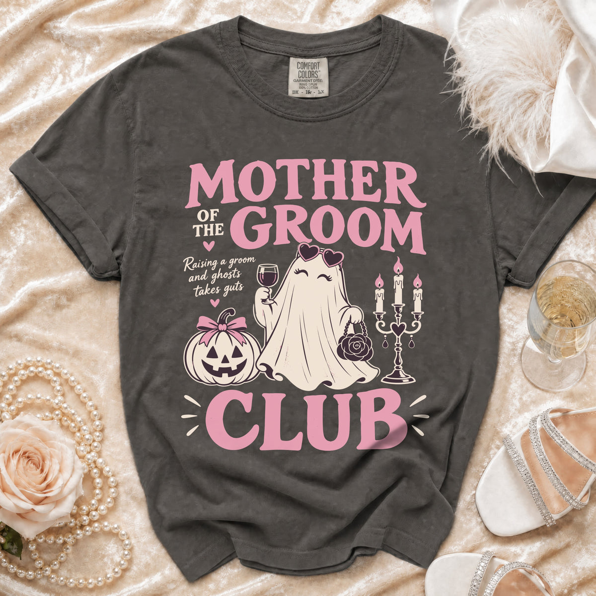 Mother of the Groom Club t-shirt with ghost, pumpkin, and candles graphic.