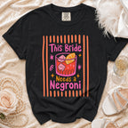 Black t-shirt with "This Bride Needs a Negroni" text and cocktail graphic.