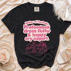 Black t-shirt with pink text: Mother of the Bride, Professional dress fluffer & happy cry expert.