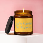 Amber jar candle with lid off, reading "You're Married. I'm Napping."