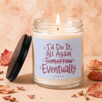 Candle with label "I'd Do It All Again Tomorrow Eventually" on a light peach background.