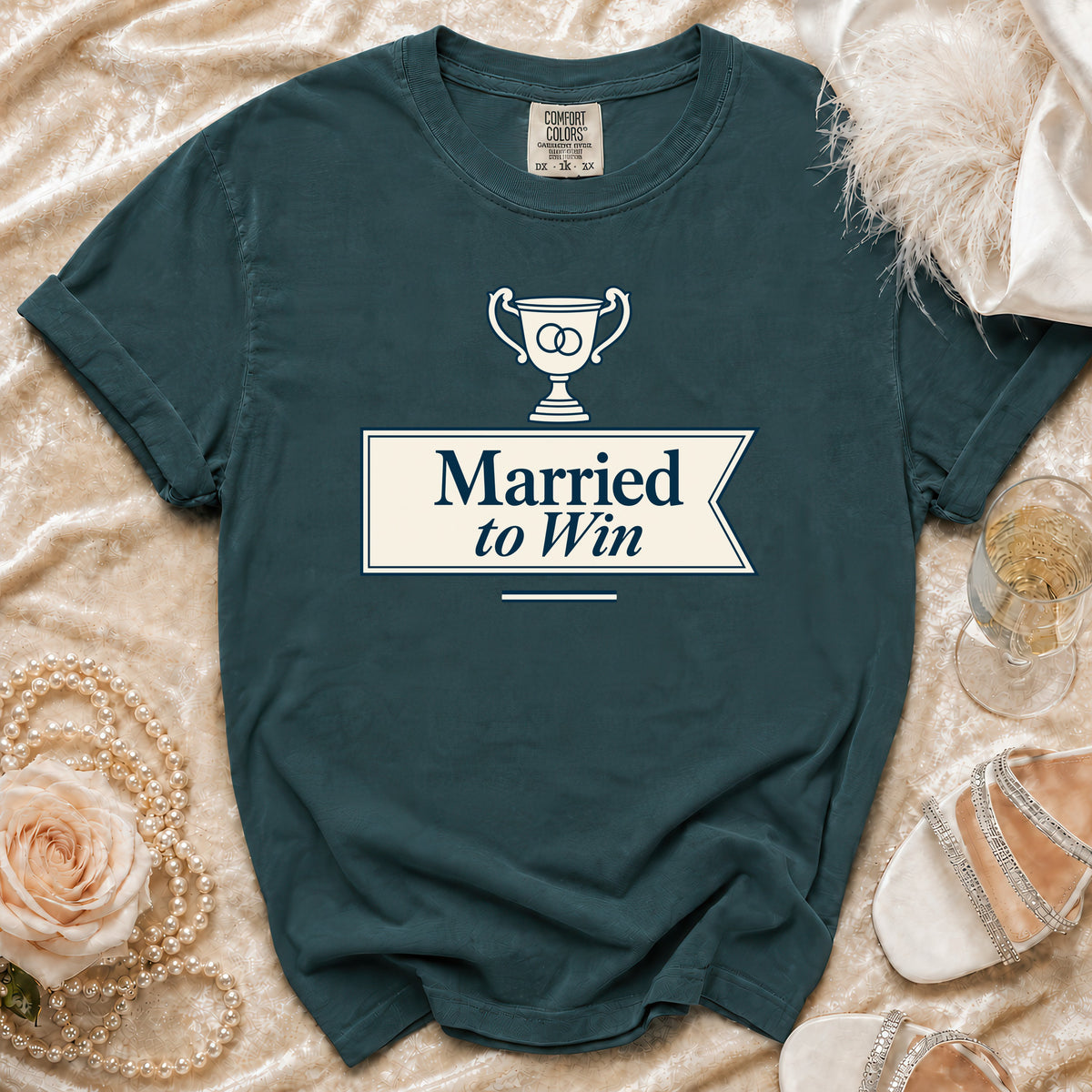 Teal t-shirt with trophy graphic and text "Married to Win".