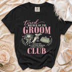 Black t-shirt with "Tired Mother of the Groom Club" text and illustrations.