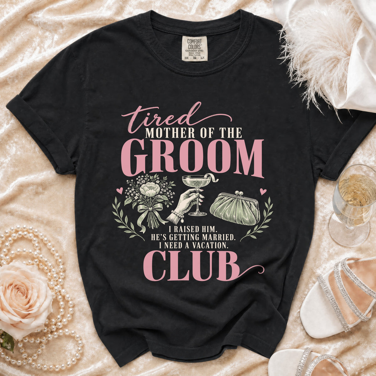 Black t-shirt with "Tired Mother of the Groom Club" text and illustrations.
