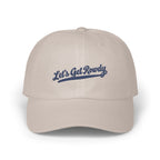 Beige baseball cap with blue embroidered text reading "Let's Get Rowdy" on the front.