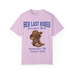 Lavender t-shirt with cowboy boots and "Her Last Rodeo Jennifer's Back" text.
