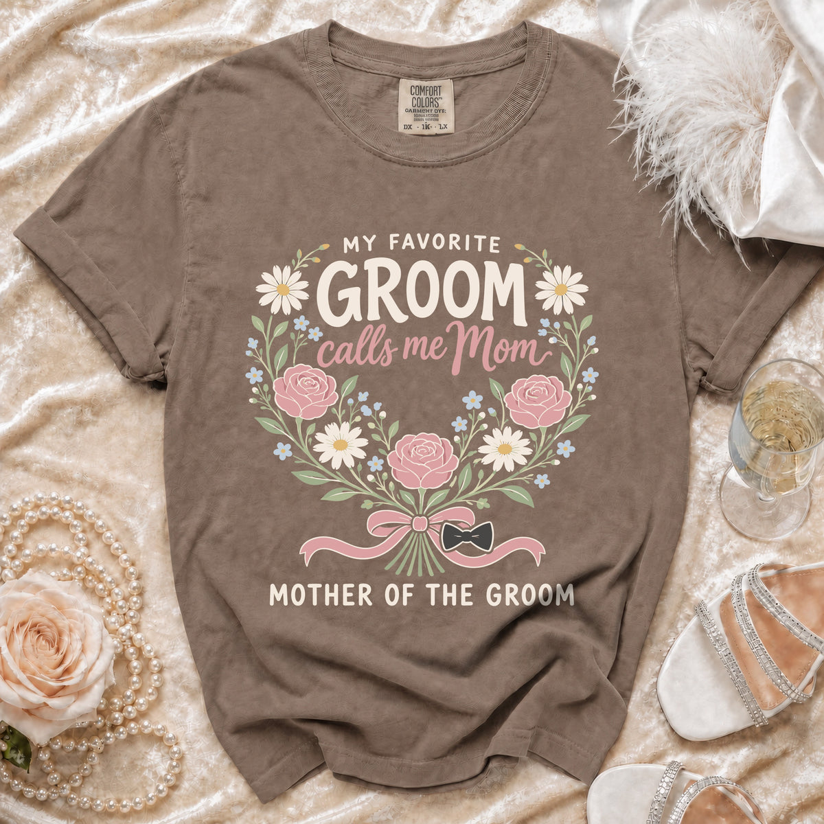 Brown t-shirt with floral wreath and text "My Favorite Groom Calls Me Mom Mother of the Groom".