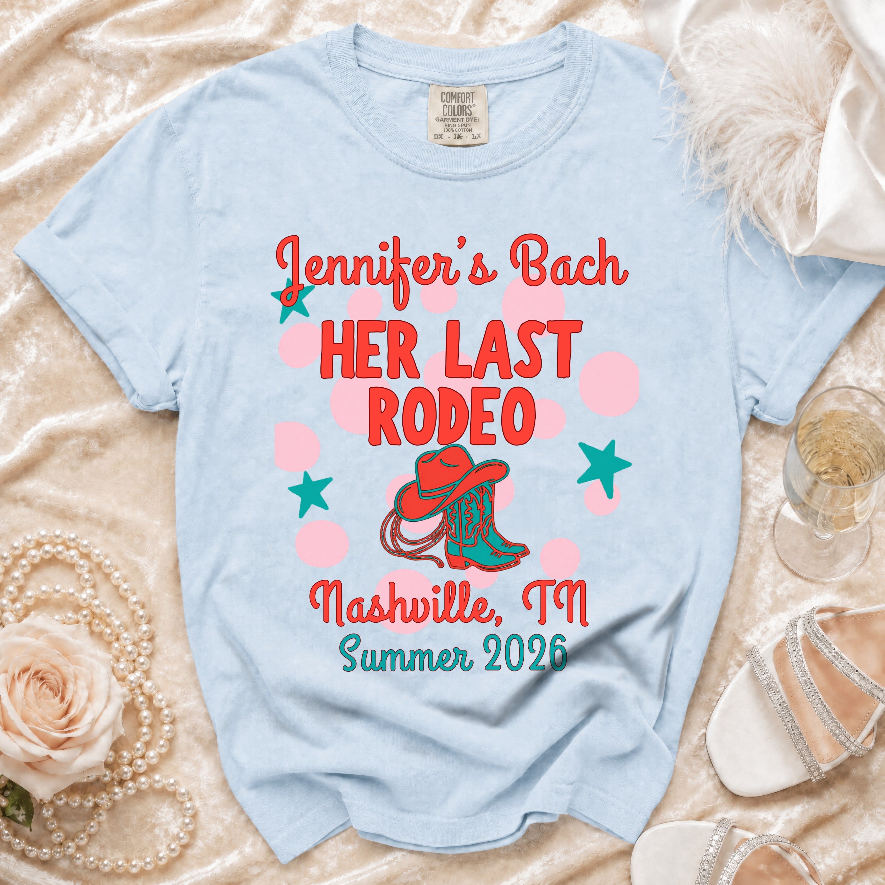 Light blue t-shirt with "Jennifer's Bach HER LAST RODEO Nashville, TN Summer 2026" design.