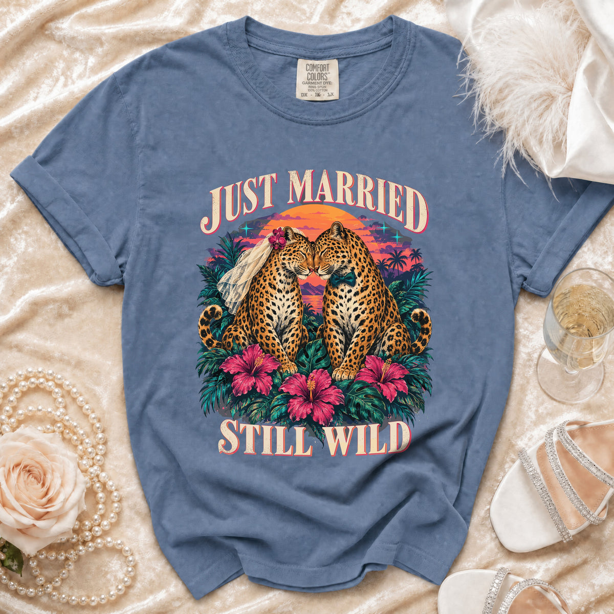 Blue t-shirt with two leopards wearing a veil and bow tie, "Just Married Still Wild" text.