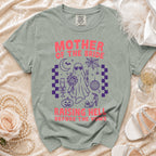 "Mother of the Bride Raising Hell Before the Vows" graphic tee with spooky elements.