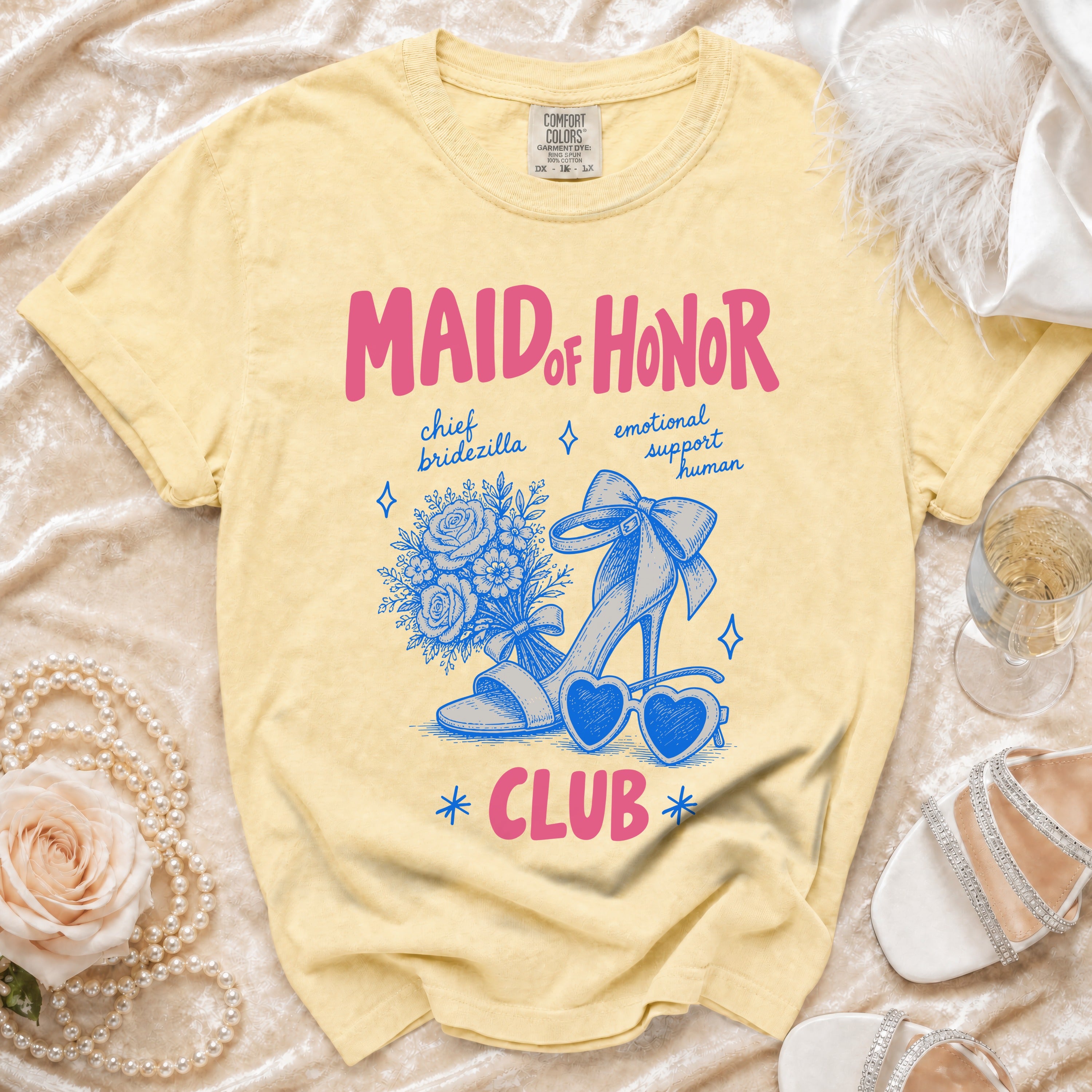 Maid of Honor Club t-shirt with text, bouquet, stiletto heel, and heart sunglasses graphic.