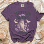 Purple t-shirt with "Mother of the Bride" text, ghost graphic, and "Raising the Bride, Surviving the Planning" tagline.