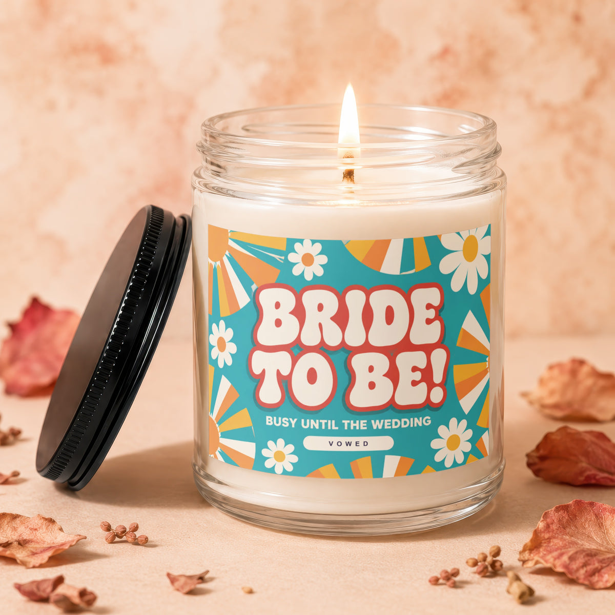 Candle with "BRIDE TO BE! BUSY UNTIL THE WEDDING VOWED" text.