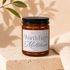 Amber candle labeled "Smells Like Worth Every Meltdown" by Vowed.