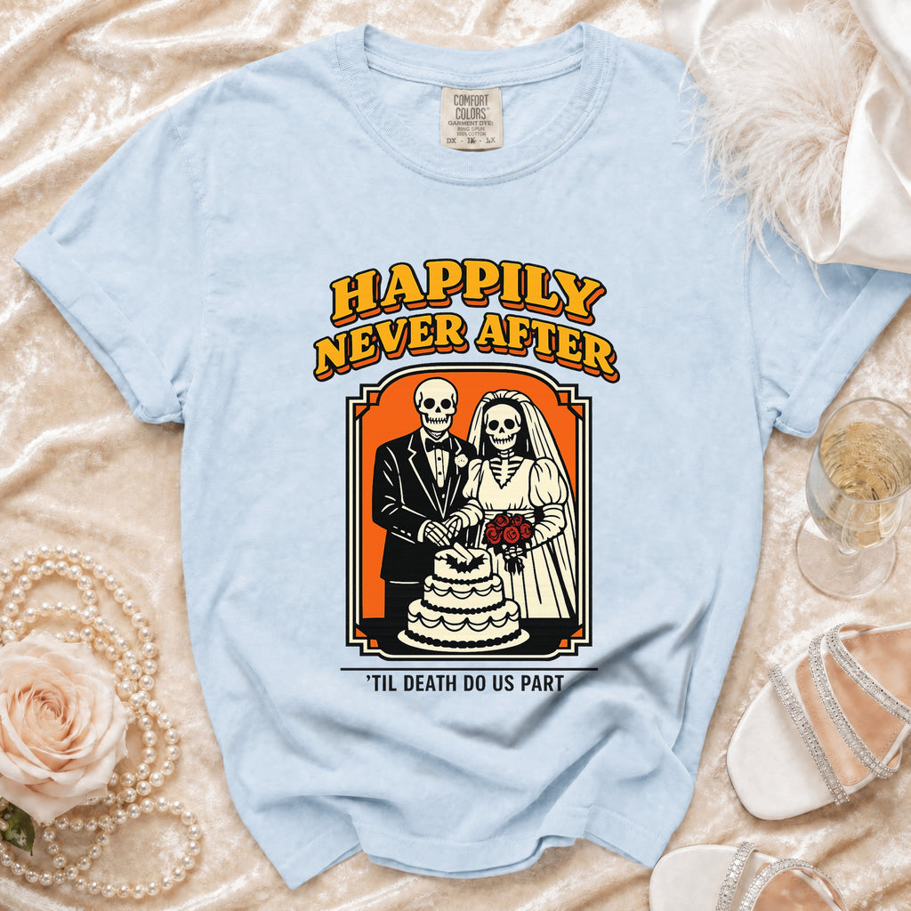 Light blue t-shirt with skeletons in wedding attire cutting a cake.