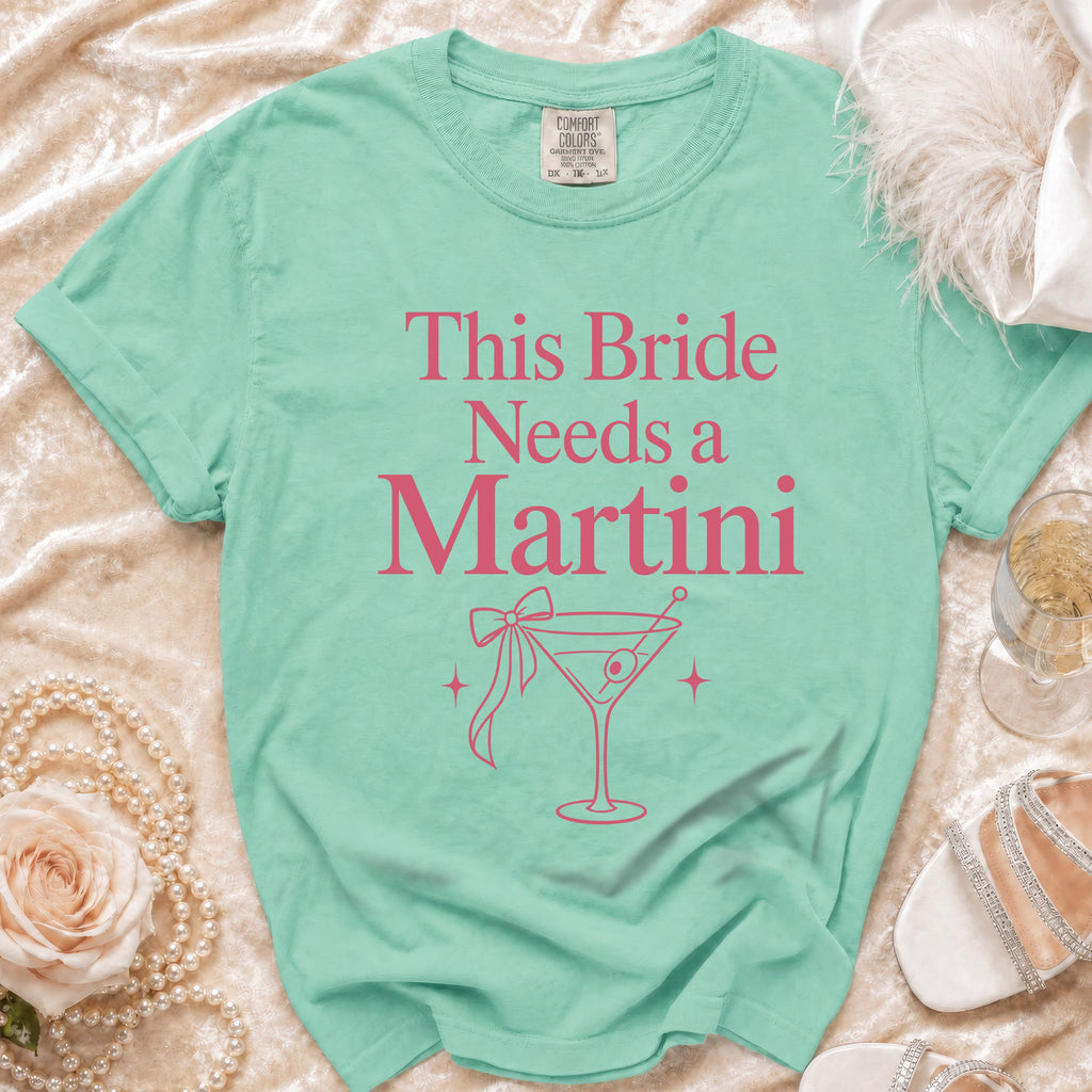 Mint t-shirt with "This Bride Needs a Martini" and martini glass graphic.