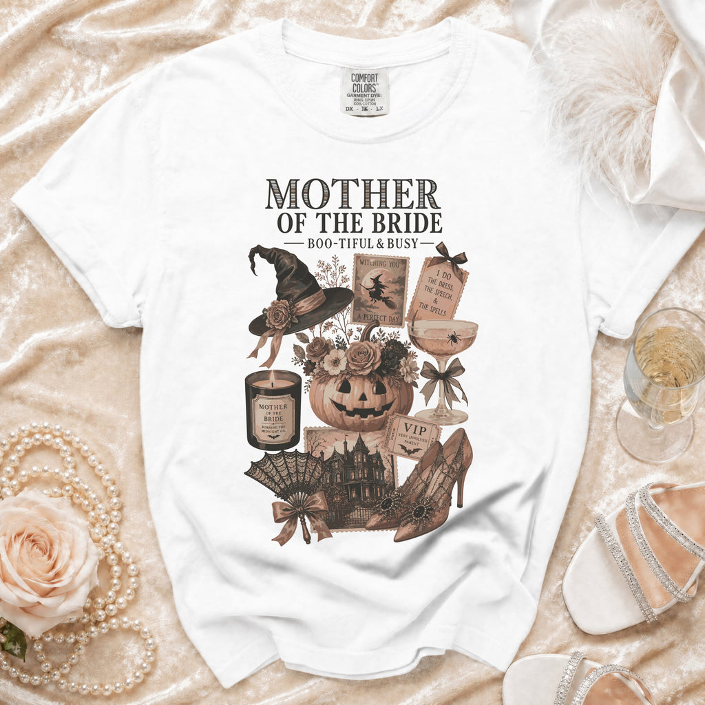 White t-shirt with "Mother of the Bride - Boo-tiful & Busy" Halloween graphic.