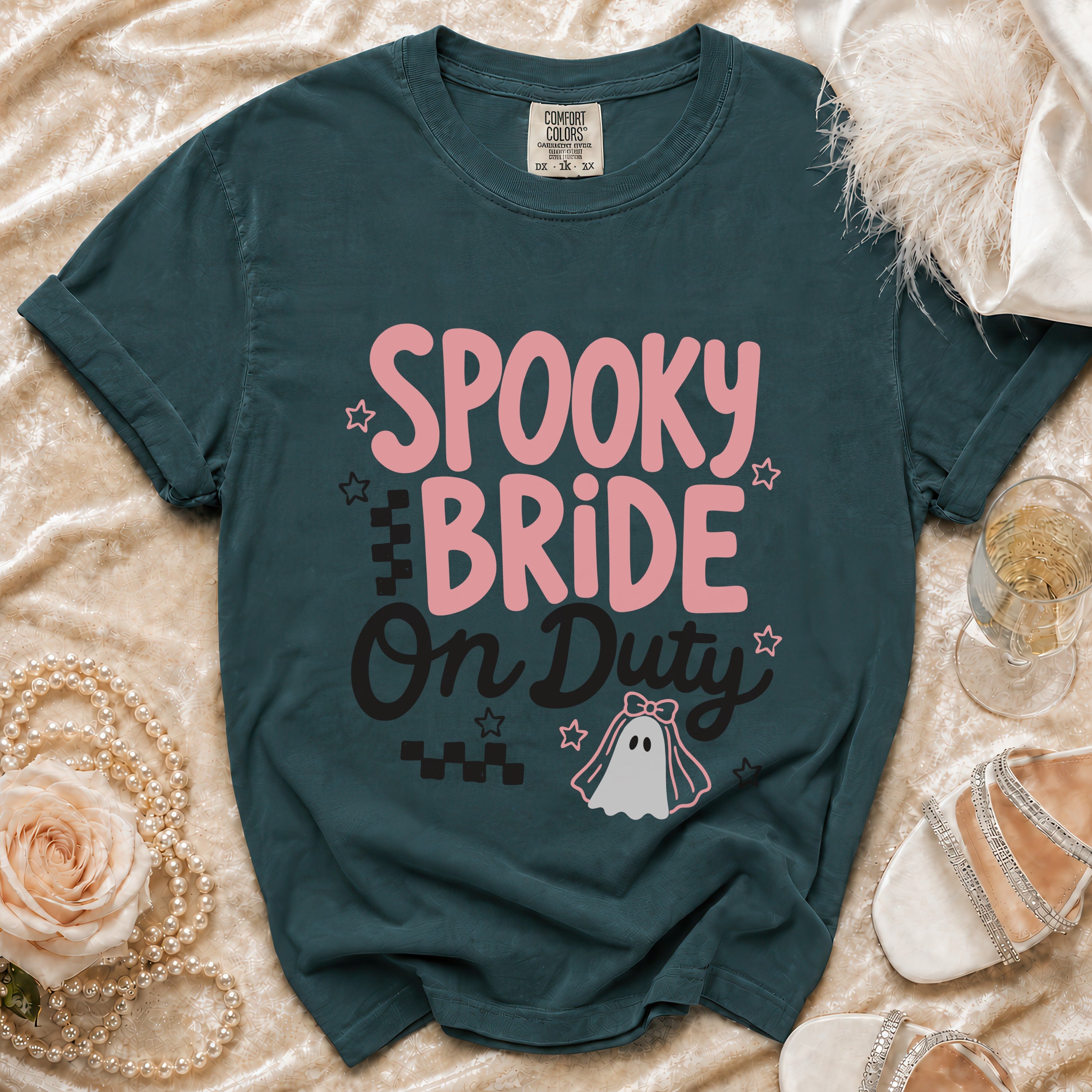 Teal t-shirt with "Spooky Bride On Duty" text and a ghost graphic.
