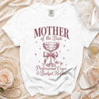 White t-shirt with "Mother of the Bride" and other text, plus a goblet graphic.