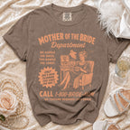 Brown t-shirt with "Mother of the Bride Department" text and illustration.