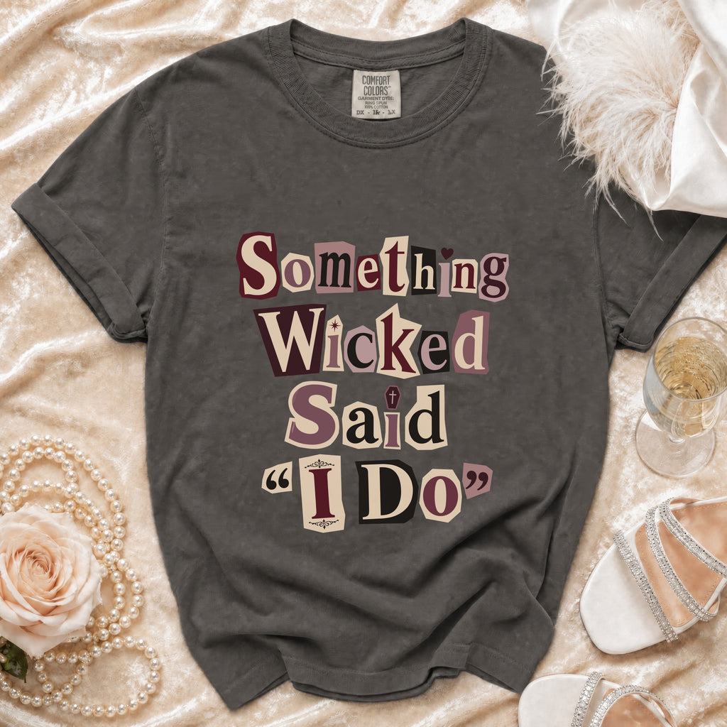 Dark grey t-shirt with "Something Wicked Said "I Do"" text in ransom note style.