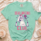 Mint green t-shirt with skull bride graphic and "DEAD GORGEOUS CLUB" text.