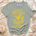 Yellow "Last Splash Sarah's Bach" graphic on a gray t-shirt with waves and cocktail shaker.