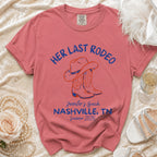 Pink t-shirt with "Her Last Rodeo" cowboy boots and hat, Nashville, TN Summer 2026.