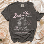 Gray t-shirt with "Best Mom by Default Raising the Bride. Surviving the Halloween." text.